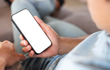 cell phone blank white screen mockup.hand holding texting using mobile on desk at office.background empty space for advertise.work people contact marketing business,technology