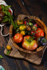 assortment of fresh local red and yellow tomatoes, ideal for healthy cooking, organic eating, and vegetarian dishes.