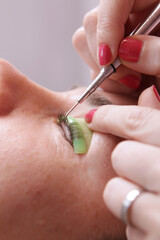 Eyelash care procedures. Lamination of eyelashes. The concept of beauty. Close-up.