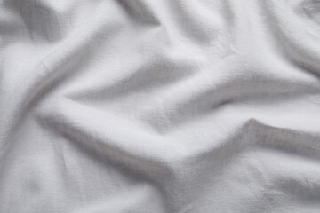 Texture of white fabric as background, top view