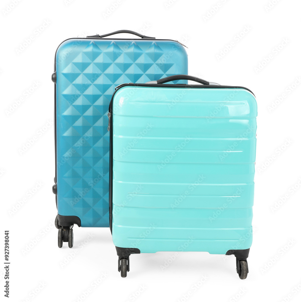 Sticker Two new light blue suitcases isolated on white