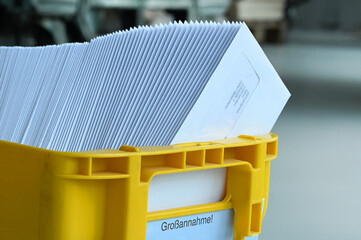 Mailbox with letter mailing sorted by zip code for delivery and postage optimization when sending...