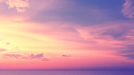Fototapeta premium A serene sunset over calm waters reflecting pastel colors at a coastal location
