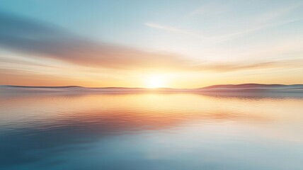 Obraz premium Serene landscape featuring a calm lake reflecting a vibrant sunset with soft clouds drifting across the sky.