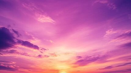 Fototapeta premium Sunset over calm ocean with vibrant purple and orange sky at dusk