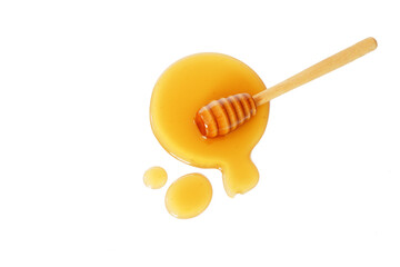 Honey drop and honey spoon on white background