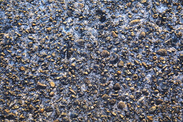 デザイン的なコンクリートに混ざる石