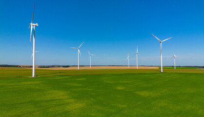Windmills, wind power plant on a clear day