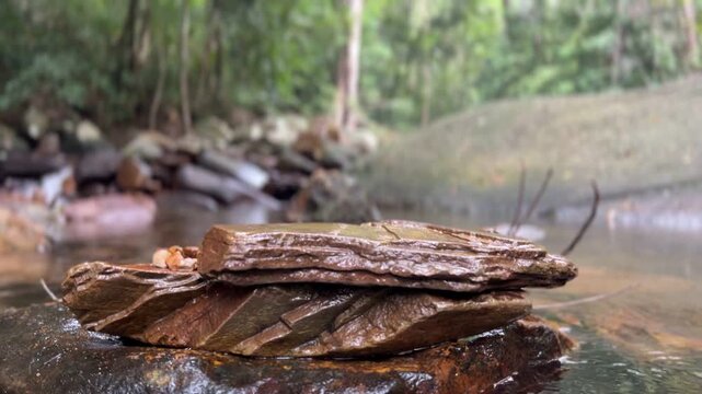 Stone podium Setting in The River with natural jungle background, peaceful view and sound