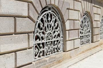 Forged architectural details - figured lattice painted white