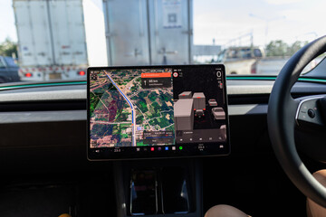 Woman hand drive modern EV car use GPS navigator travel trip