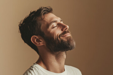 Obraz premium A close up of a man's face with her eyes closed