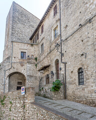 stone ramp and medieval tall houses at historical hilltop little town, Narni, Italy