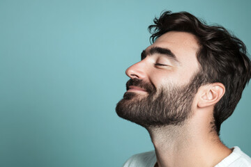 Fototapeta premium A close up of a man's face with her eyes closed