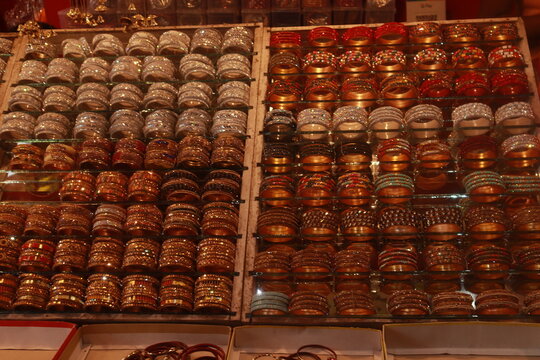 A Mela Stall or stand filled with ladies fashion accessories and bangles or hair pins and other kadas
