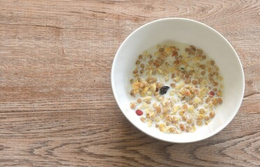 fruit granola dry cereal breakfast eat with fresh milk on bowl
