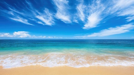 Fototapeta premium Tranquil Beach Landscape with Clear Sky and Wispy Clouds on Horizon