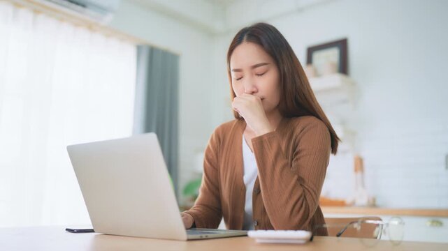 Office syndrome. Overworked tired young asian woman feeling headache, having eyesight problem after computer laptop work. Stressed young woman suffering from fatigue at home