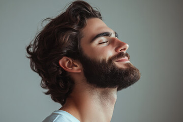 Obraz premium A close up of a man's face with her eyes closed