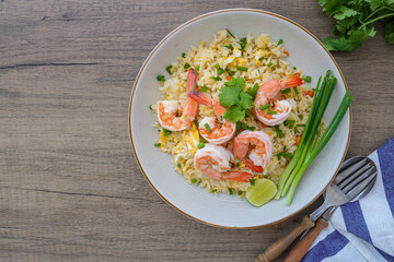 Fried rice with shrimps on a white plate