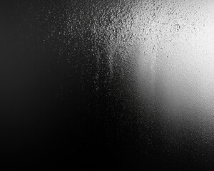 subtle gradient of light and dark tones with a textured surface creating a monochrome abstract design with reflective highlights