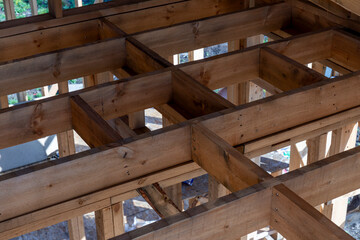 Wooden frame ceiling of frame house, house construction.
