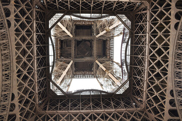 close-up of the metalwork of the eiffel tower. view of the bottom of the tower