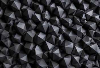 Close-up of abstract black geometric shapes, creating a dense, textured surface.
