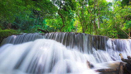 Obraz premium Beauty in nature, amazing waterfall in tropical forest of national park, Thailand