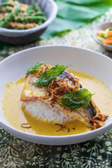 Indonesian curry with crispy sea bass and rice