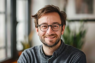Obraz premium Smiling Man with Glasses