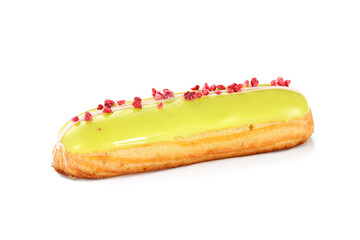 Beautiful french eclair with pistachio filling isolated on white background