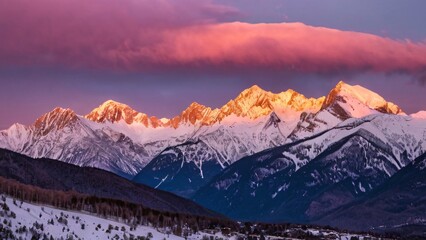 Snow-Capped Mountains Glow at Sunset