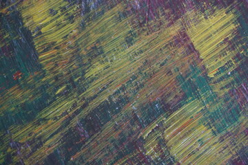 Abstract yellow acrylic paint splatter on turquoise paint surface, Colorful messy paint splash...