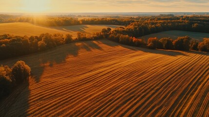 Fototapeta premium Drone footage of picturesque autumn farmland and stunning natural scenery from above