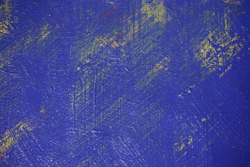 Abstract yellow paint brush splatter on a blue texture surface, Vintage yellow paint stroke pattern on a dark blue background, Colorful grungy paint splash backdrop