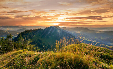 panoramic mountain landscape at sunset on the ridge of the Nagelfluh mountains chain chain near...