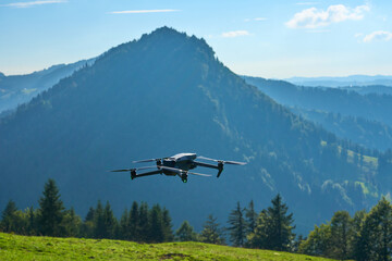 flying drone in the Allgaeu mountains taking pictures and movies