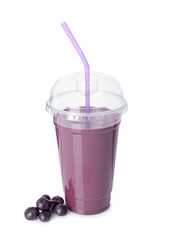 Tasty acai juice and berries isolated on white