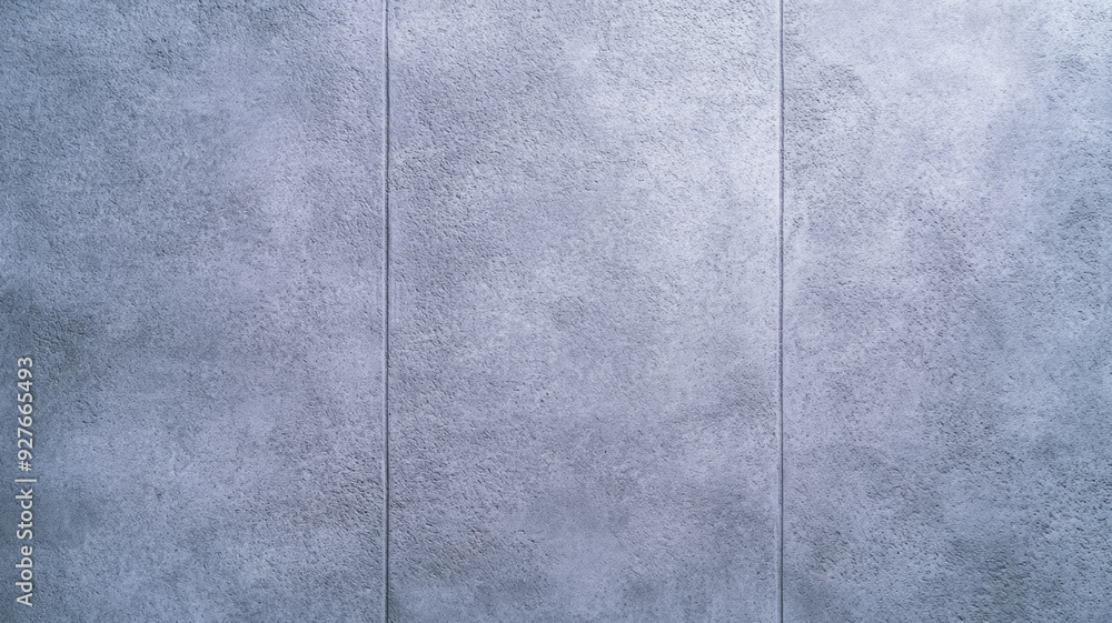 Aufkleber overhead view of a plain concrete wall surface with soft shadow details and subtle texture light gra
