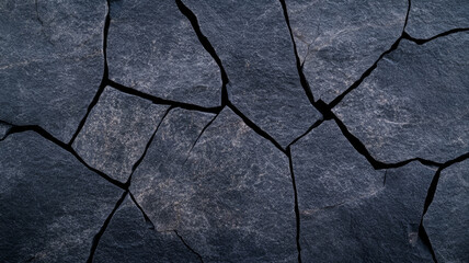 Spooky dark gray stone texture with cracks and faint shadowy shapes Halloween haunted vibe eerie coldness suitable for eerie designs 