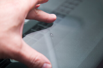 Repair of chips and cracks on the windshield of the car.