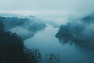 Obraz premium A foggy river scene with trees lining the banks, evoking a sense of calm and solitude in nature, A river disappearing into the fog , AI generated