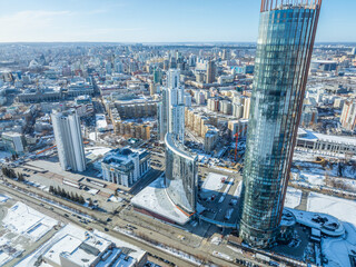 Obraz premium Yekaterinburg aerial panoramic view in Winter at sunset. Yekaterinburg city and pond in winter.