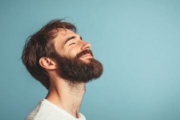 Obraz premium A close up of a man's face with her eyes closed