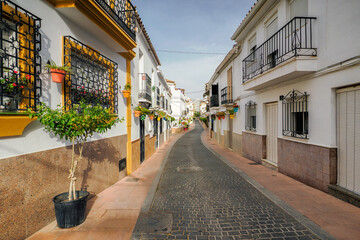 Fototapeta premium Fragment of the old town of the beautiful town of Estepona - a city located in southern Spain, near Malaga in Andalusia. The photo was taken on June , 2024