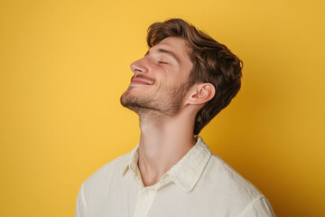 Obraz premium A close up of a man's face with his eyes closed