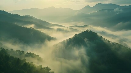 Obraz premium The hills are surrounded by dense fog