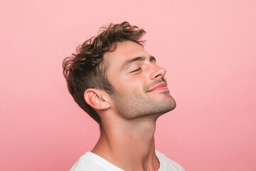 Fototapeta premium A close up of a man's face with his eyes closed