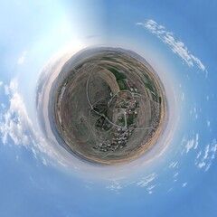 Little planet transformation of spherical panorama 360 degrees. Spherical abstract aerial view in beautiful city. Curvature of space.